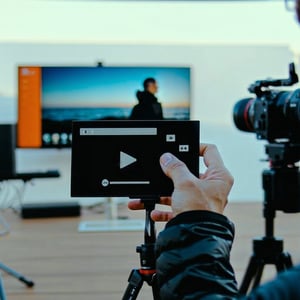 customized video player with active motion in the background of the player not animated but made to look like a video or photo no obvious player features-1